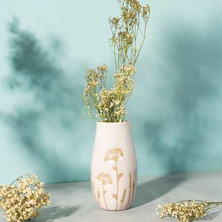 a hand-finished stoneware neutral vase with delicated cow parsley painted in a nude tone